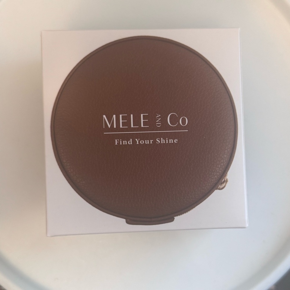Mele & Co. Round Jewelry Case